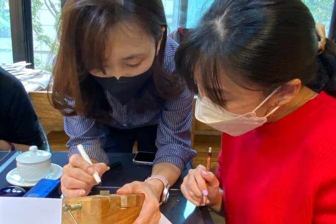 Carve Your Personal Korean Stone Seal with Jeongju in Insadong - Designing your name in Hangul