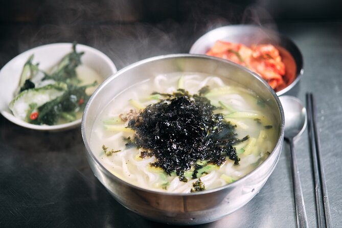Downtown Seoul Guided Food & Market Tour with 8+ Local Tastings - Palace gates and old Seoul between the stops