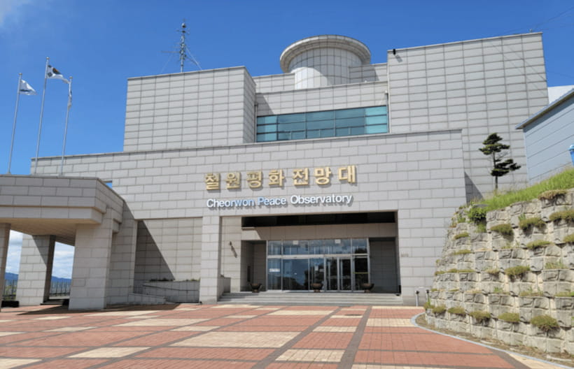 From Seoul: DMZ 2nd Tunnel & Y Shaped Suspension Bridge Tour - The Workers’ Party Headquarters adds a stark visual reminder