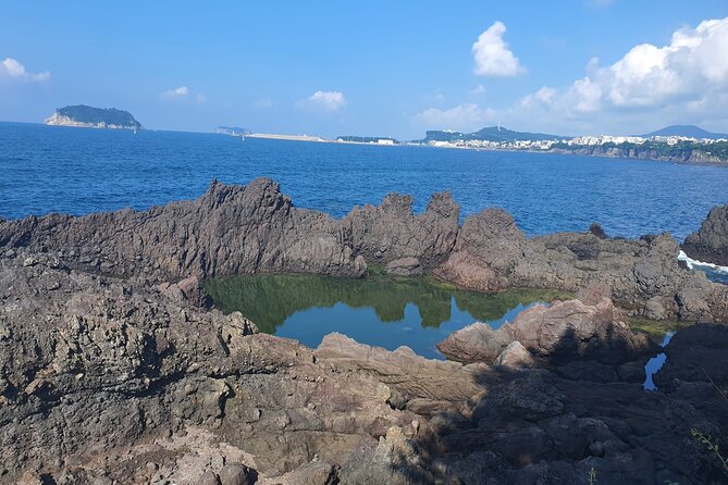 Jeju island Jumbo Taxi Private Tour with Mr.Hong South of Jeju - Oedolgae connects scenery with the Olle trail