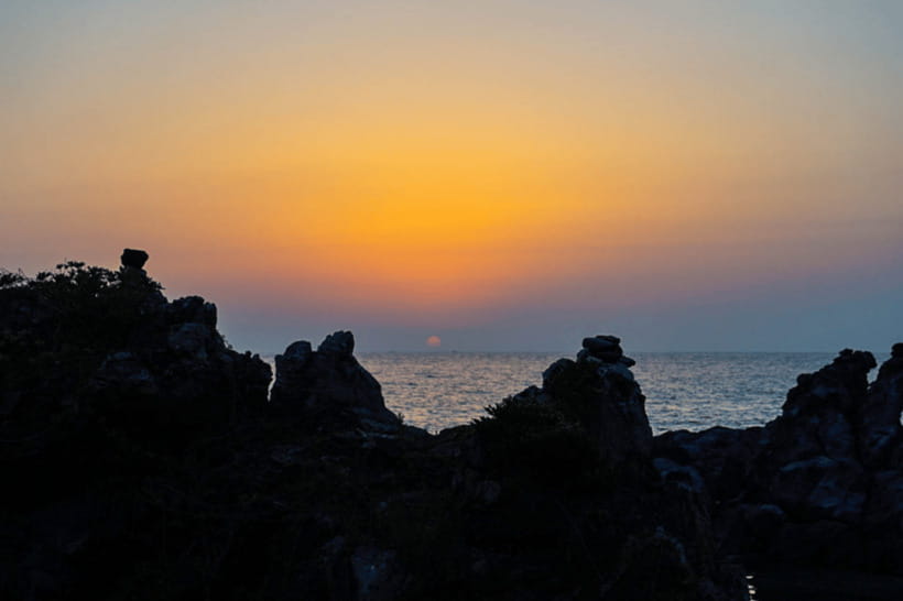 Jeju: Sunset Tour Olle Trail Walking Tour with Hotel Pickup - Walking Toward Aewol Cafe Street