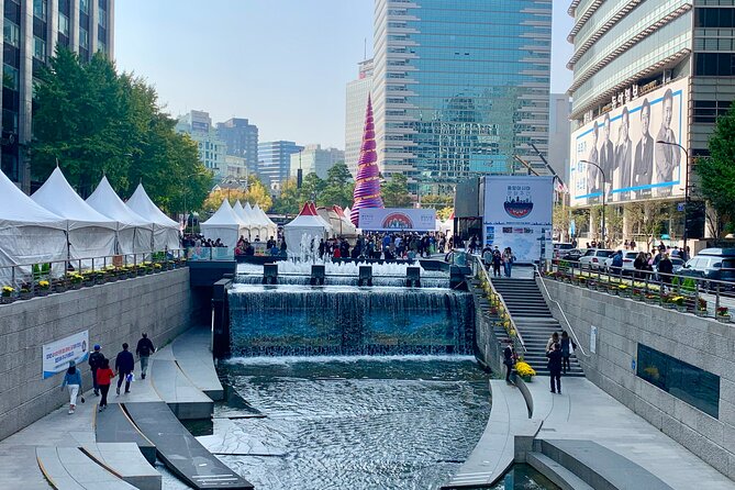Private Full-Day Guided Tour in Seoul with Lunch, Tea and Dinner - Cheonggyecheon and HiKR Ground add modern Seoul