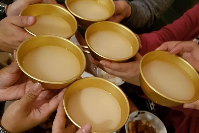 Seoul: Anthony Bourdain-Inspired BBQ and Pub Experience - Stop two: pancakes, market snacks, and traditional Korean alcohol