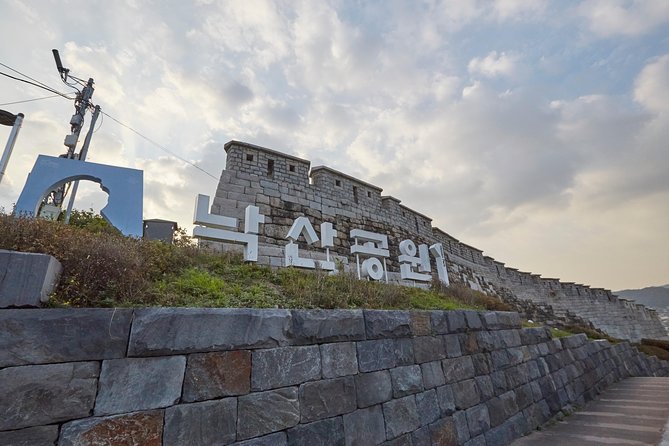 Seoul: Gyeongbok Palace, Bukchon Village, and Gwangjang Tour - Bukchon Hanok Village, with photo stops and a reality check