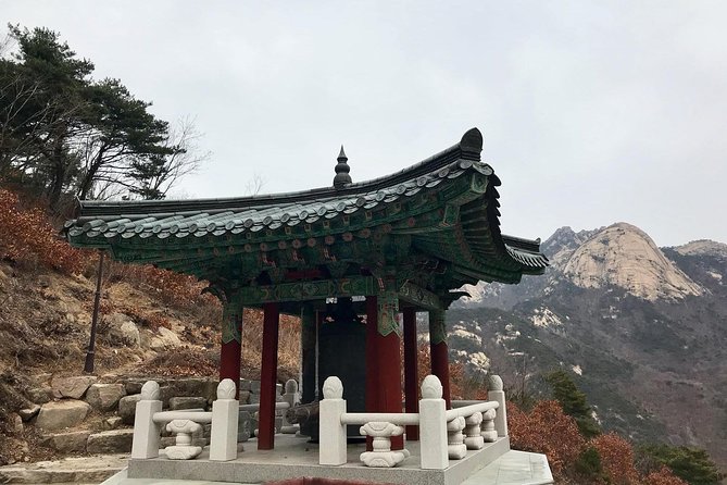 Seoul Mountain Hike: Temples, Folklore & Traditional Meal - Buddhist Temples and Shamanic Places in Rocky Corners