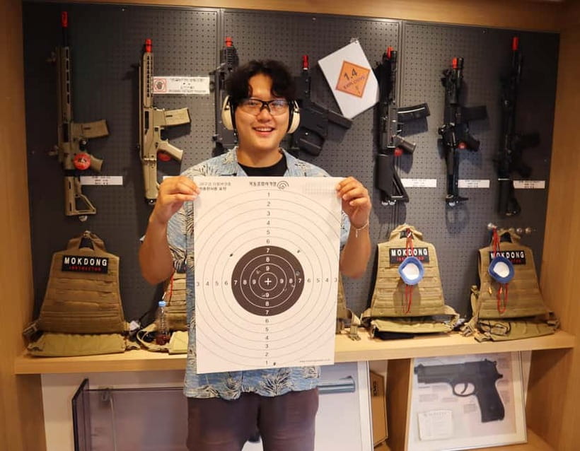 Seoul: Olympic-Style Shooting & Korean Food Experience - Ten live rounds with a 9mm handgun
