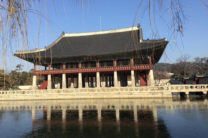 Small-Group Royal Palace and Seoul City Tour (hotel pick-up) - The National Folk Museum in the palace grounds